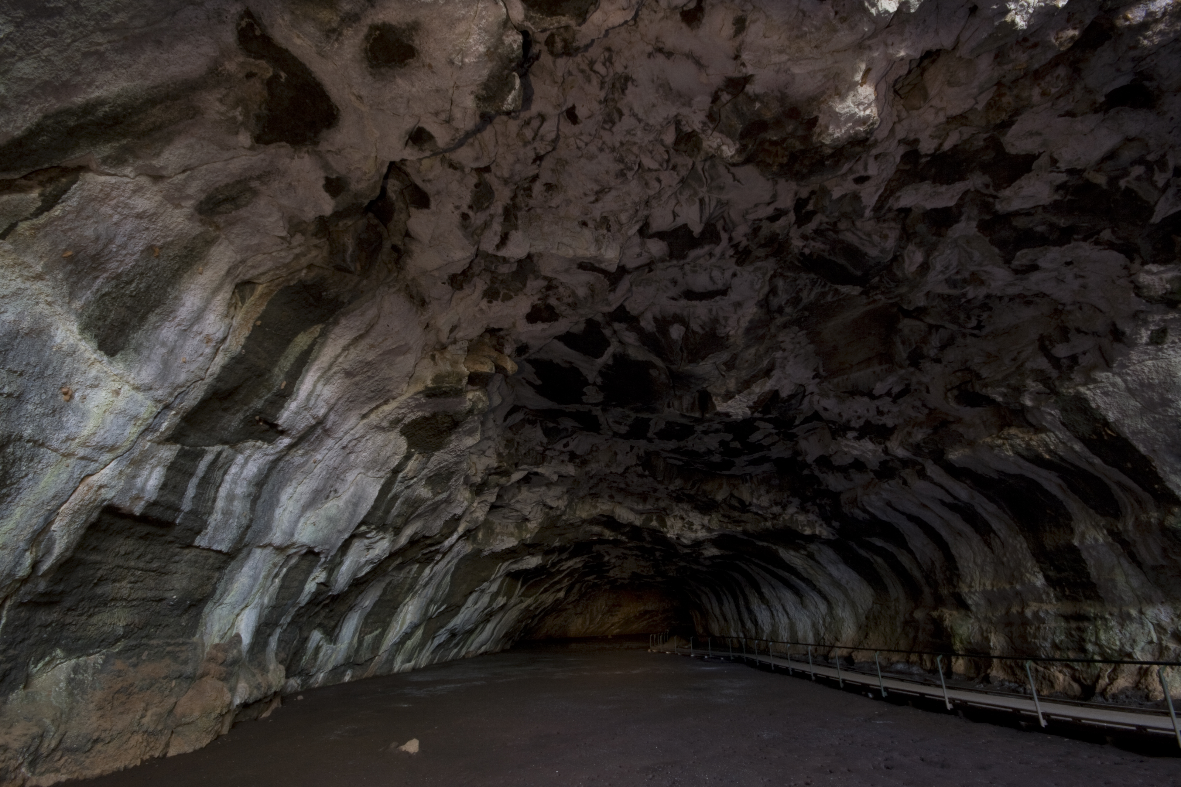 Lava_Tube_-_Road_Cave_-_Lower_Deck_-_Naturaql_Light_and_Spotlight_rear_cave.jpg